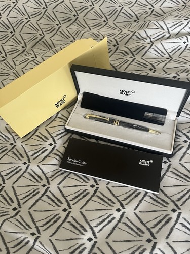 Black and gold montblanc - black,